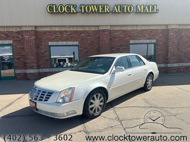 
                           2008 Cadillac DTS  DTS in front of Clock Tower Mall Used car business
                       