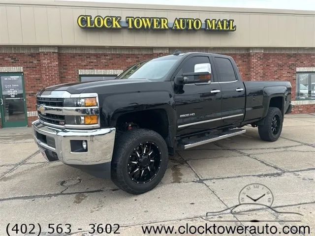 
                           2018 Chevrolet Silverado  Silverado in front of Clock Tower Mall Used car business
                       