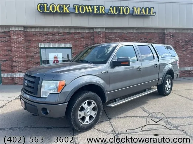 
                           2010 Ford F-150  F-150 in front of Clock Tower Mall Used car business
                       